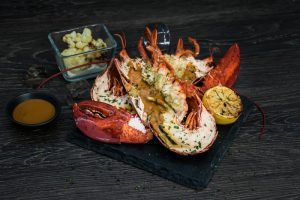 Signature Dish - Poached Half or Whole Canadian Lobster